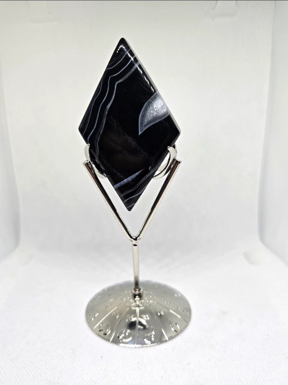 Polished Banded Black Onyx Diamond Display Specimen on Metal Stand.